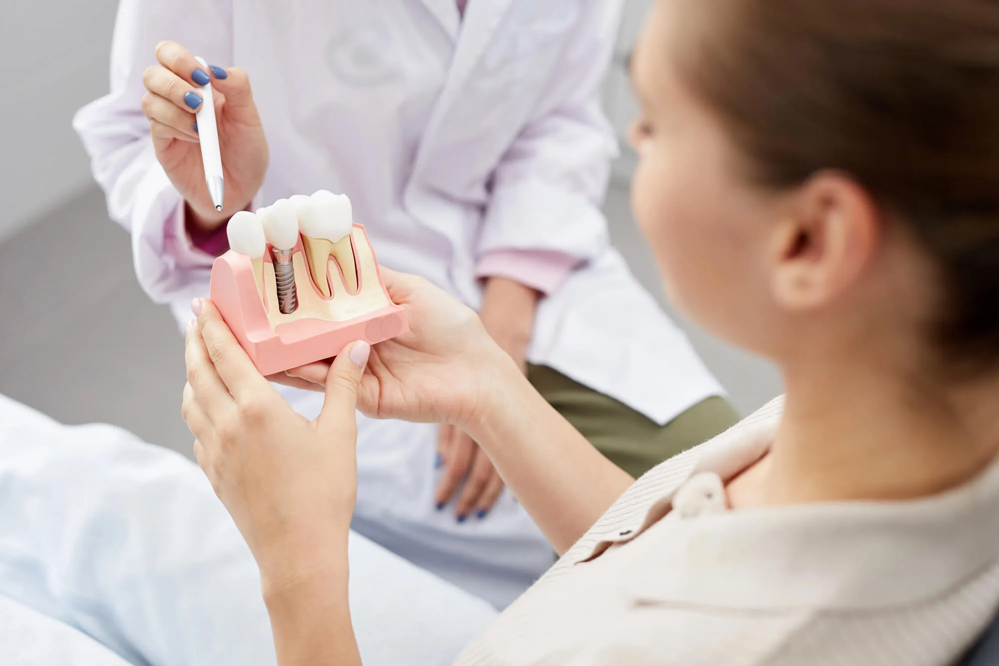 dentist-explaining-full-mouth-reconstruction-walnut-creek-ca-to-patient